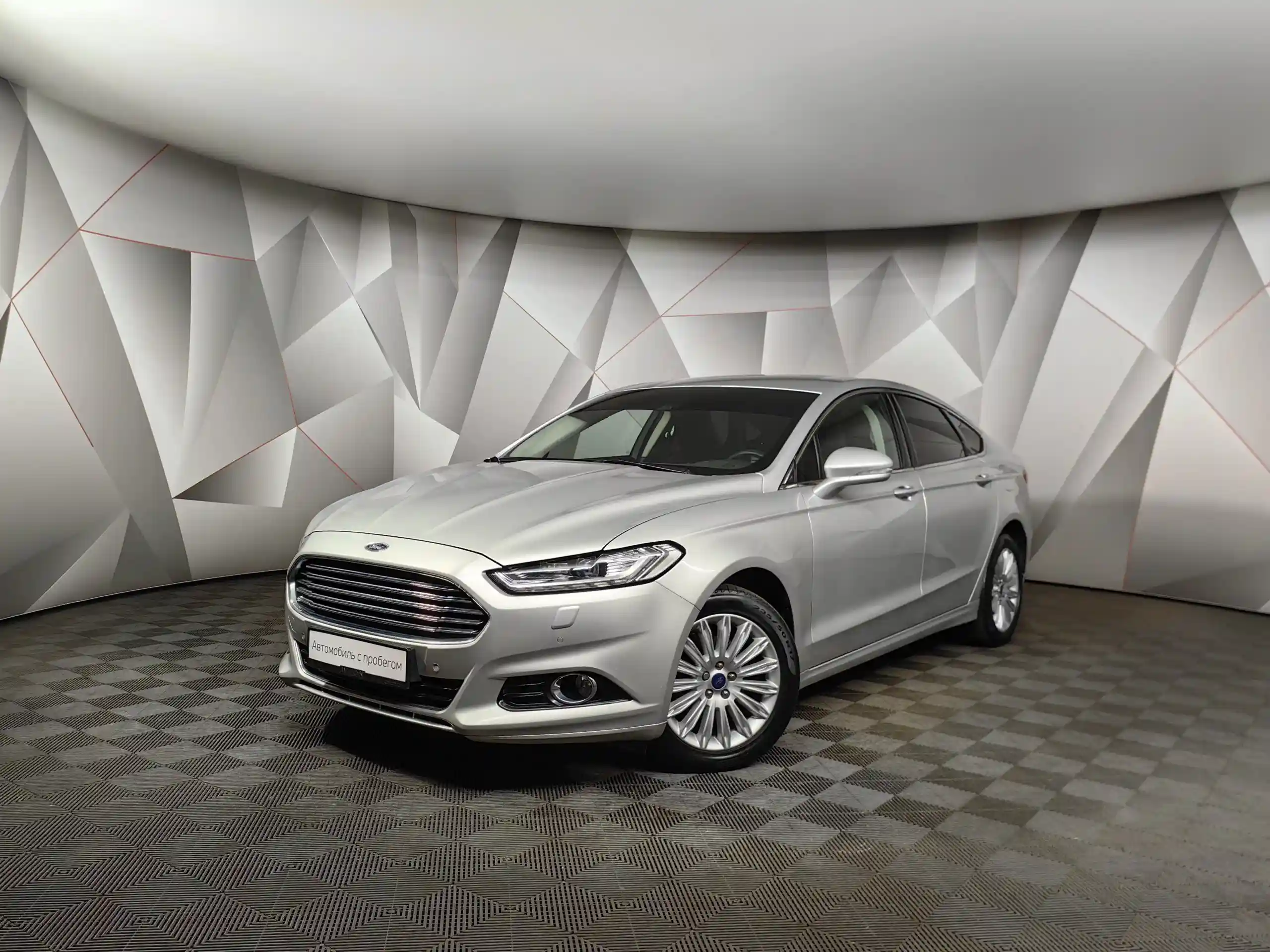 Фото автомобиля FORD MONDEO, 2016 — госномер Е699УВ777. Цвет: Серебристый