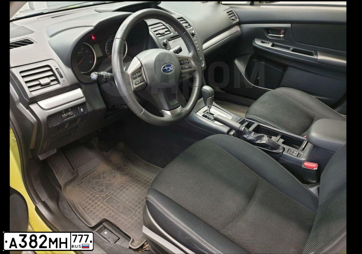 Фото автомобиля SUBARU IMPREZA, 2014 — госномер К869ЕТ138. Цвет: ЗЕЛЕНЫЙ