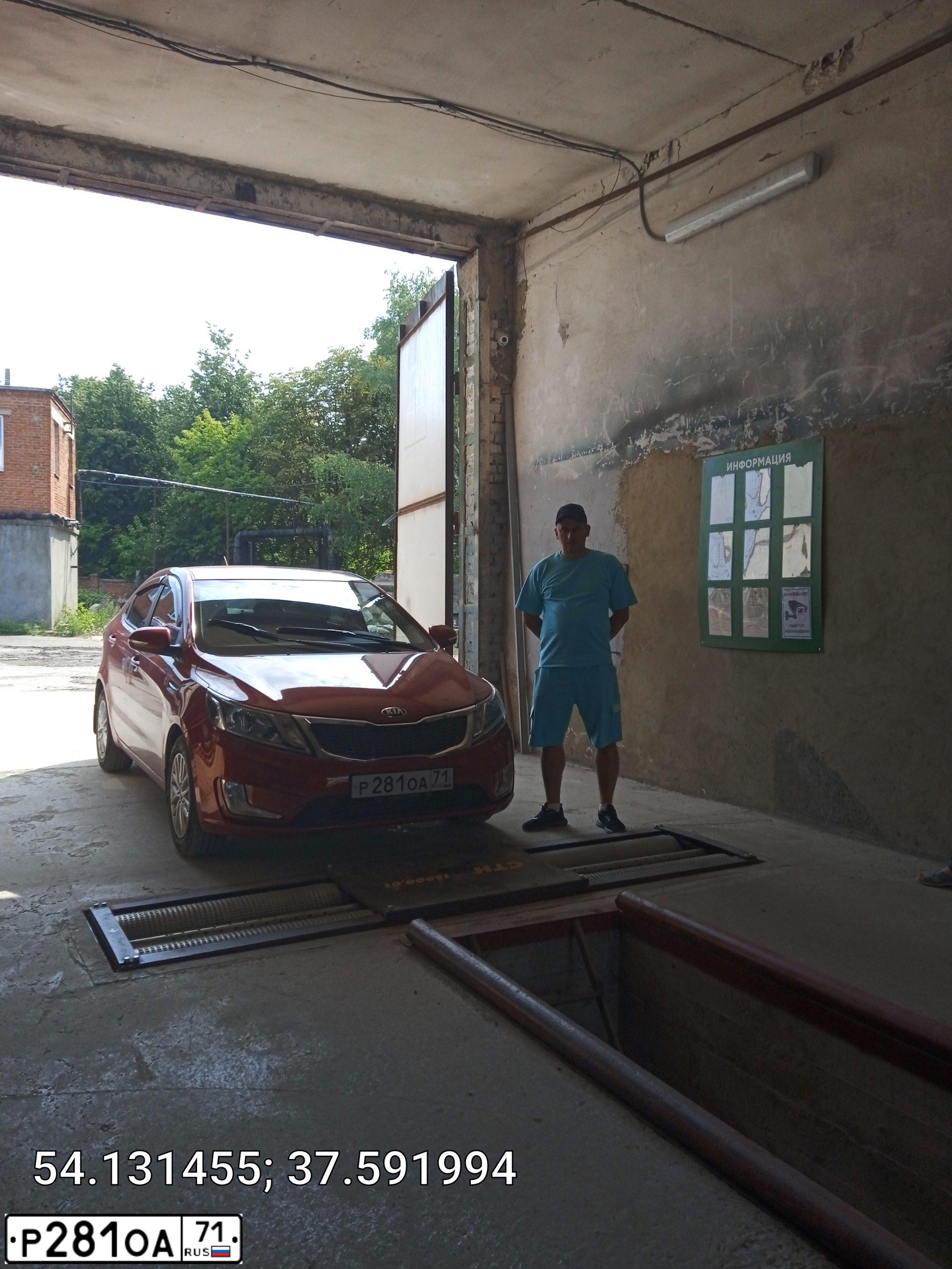 Фото автомобиля KIA RIO, 2014 — госномер Р281ОА71. Цвет: Красный
