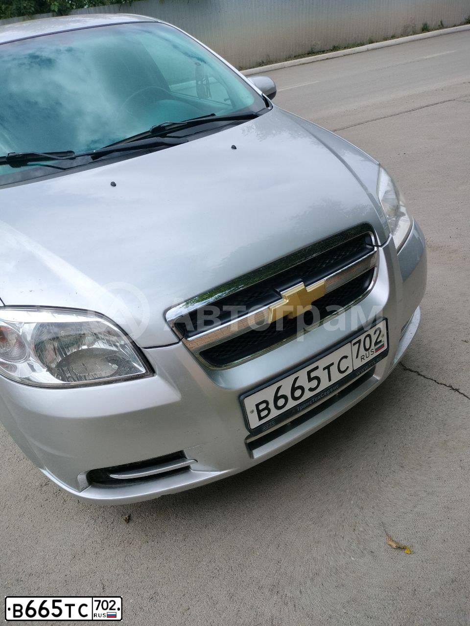 Фото автомобиля CHEVROLET AVEO, 2008 — госномер В665ТС702. Цвет: Серебристый