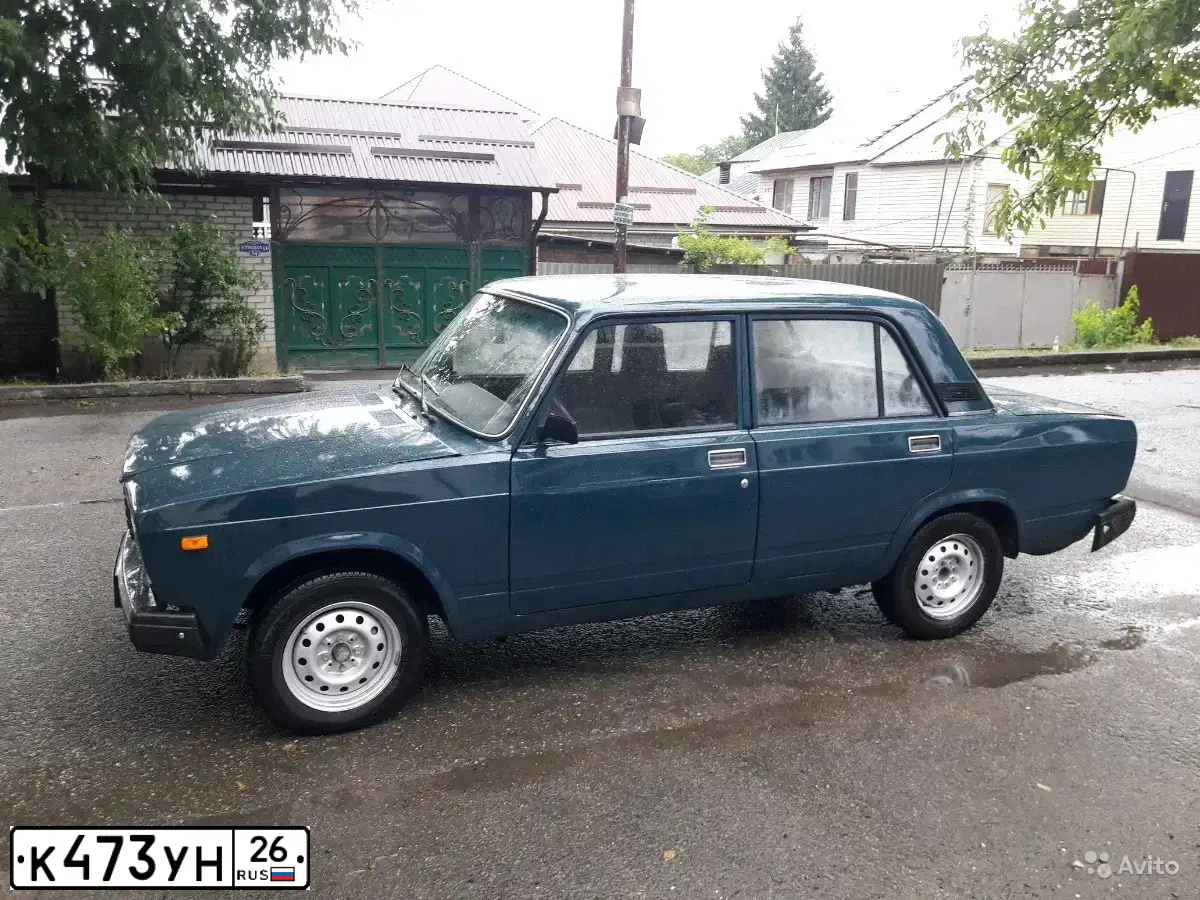Фото автомобиля LADA 2107, 2008 — госномер Н284ОТ26. Цвет: Темно-зеленый