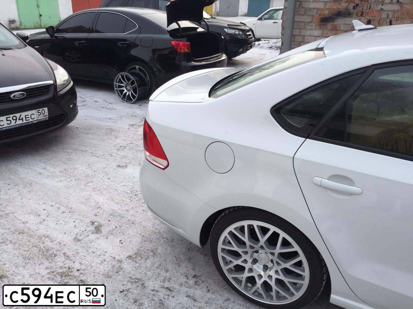 Фото автомобиля FORD FOCUS, 2010 — госномер А194КС19. Цвет: ЧЕРНЫЙ