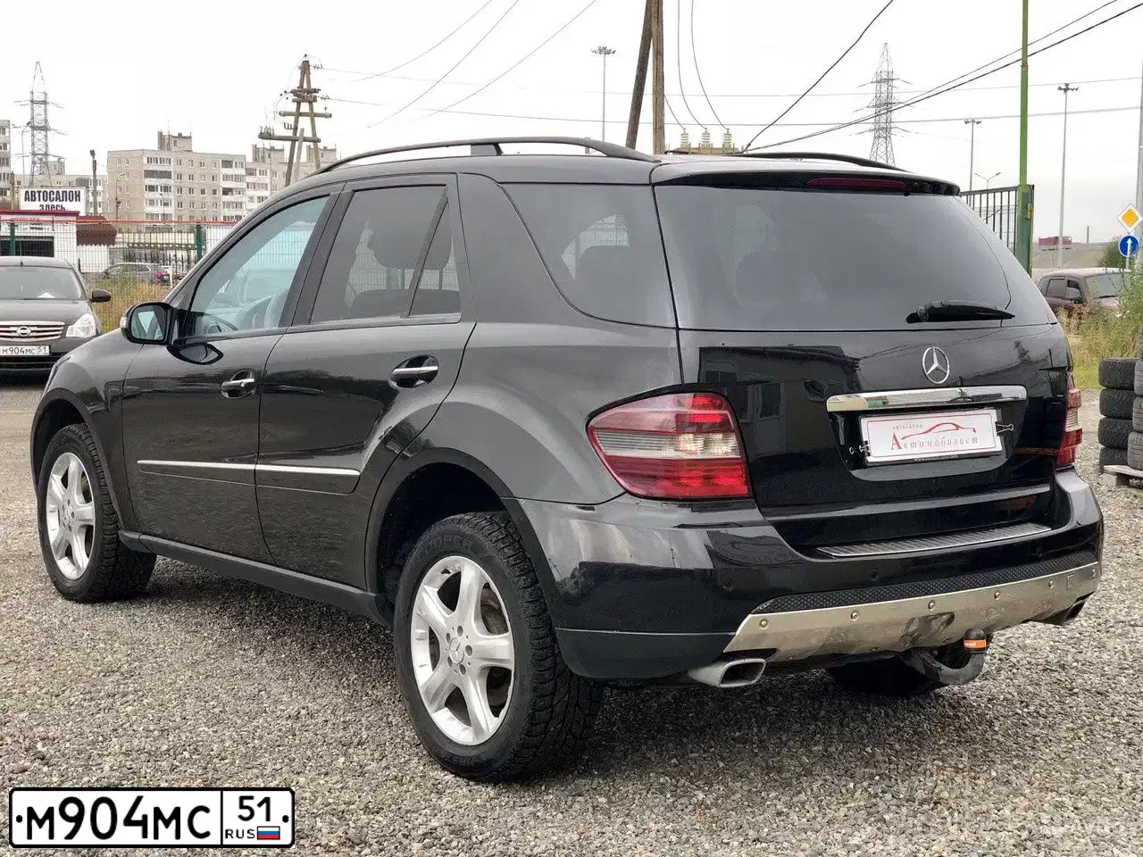 Фото автомобиля NISSAN ALMERA /AVTOVAZ/, 2014 — госномер А189СК51. Цвет: ЧЕРНЫЙ