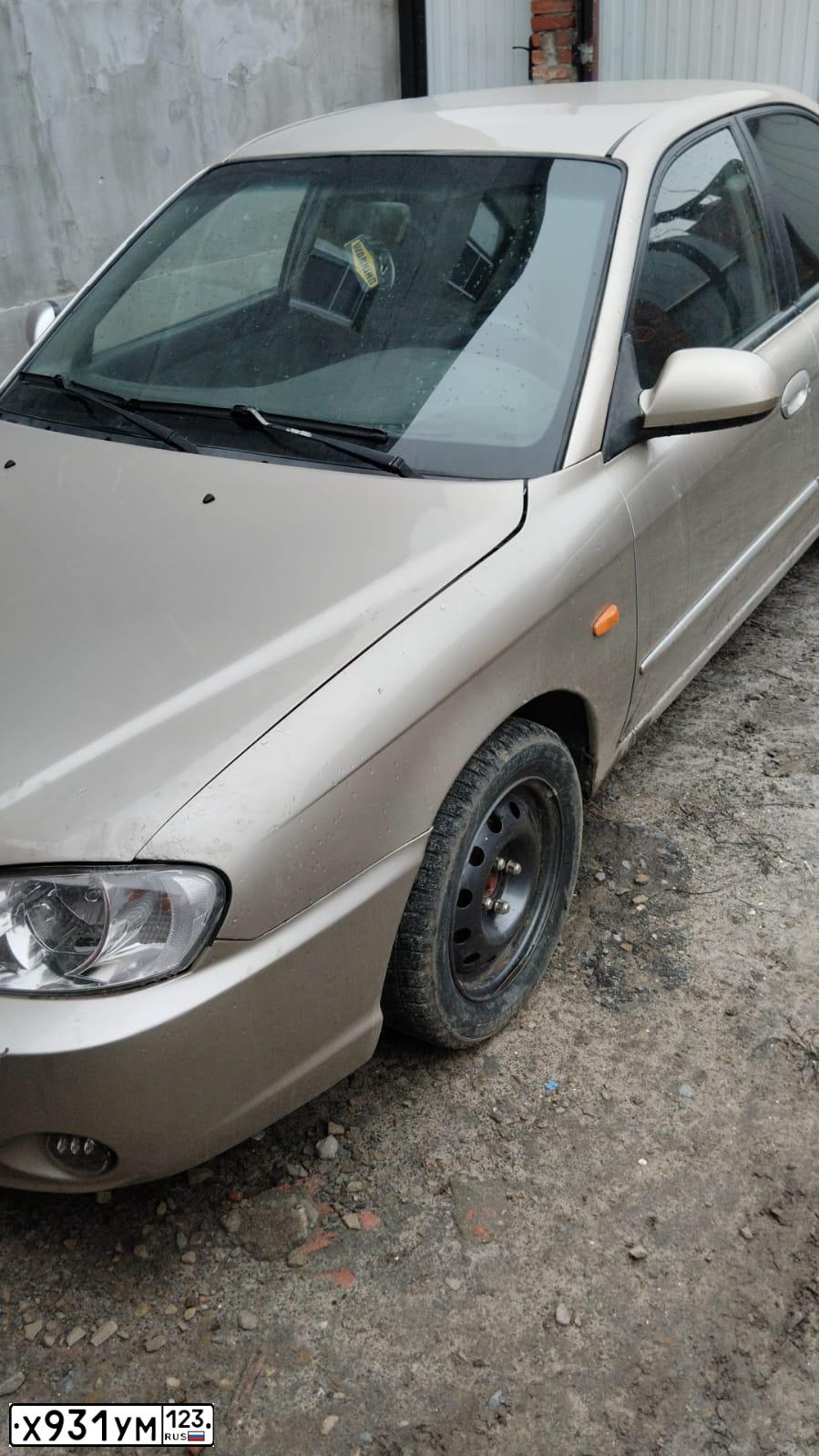 Фото автомобиля KIA SPECTRA, 2007 — госномер Х931УМ123. Цвет: Золотисто-бежевый