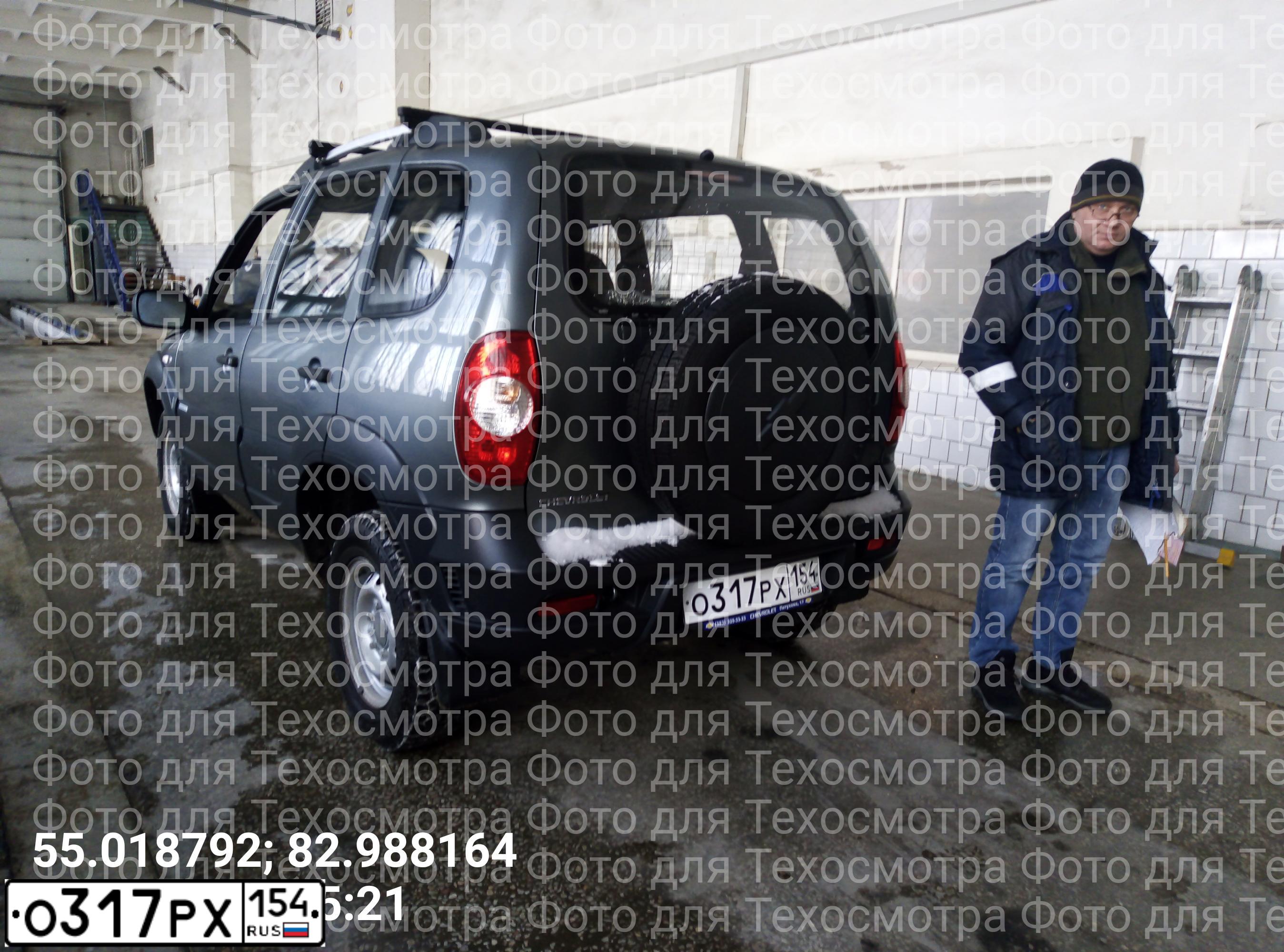 Фото автомобиля CHEVROLET NIVA, 2011 — госномер Р719ЕМ154. Цвет: ТЕМНО СЕРЫЙ МЕТАЛЛИК