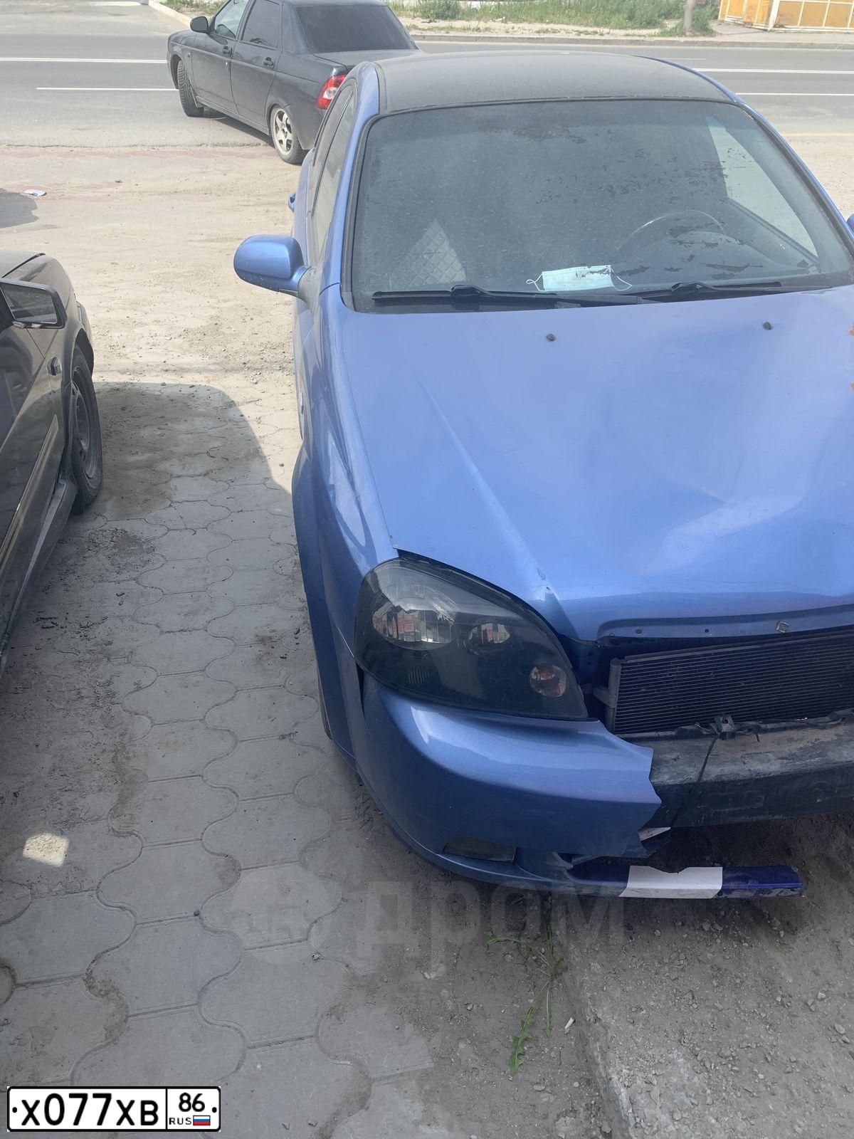 Фото автомобиля LADA 2170 PRIORA, 2008 — госномер Х077ХВ86. Цвет: ГРАФИТОВЫЙ МЕТАЛЛИК