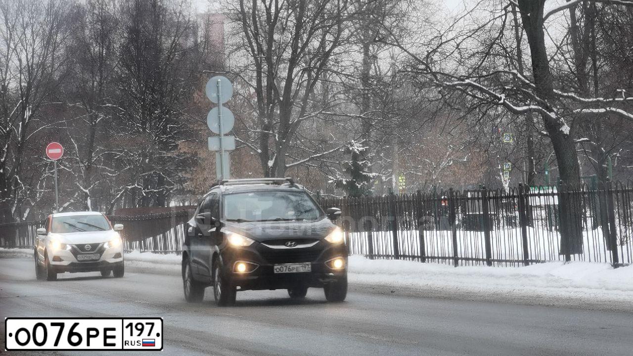 Фото автомобиля HYUNDAI IX35, 2011 — госномер О076РЕ197. Цвет: ЧЕРНЫЙ