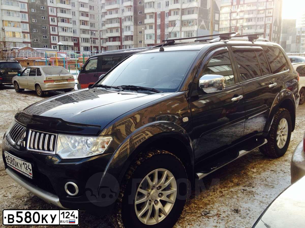 Фото автомобиля MITSUBISHI PAJERO SPORT, 2008 — госномер В580КУ124. Цвет: СЕРЫЙ