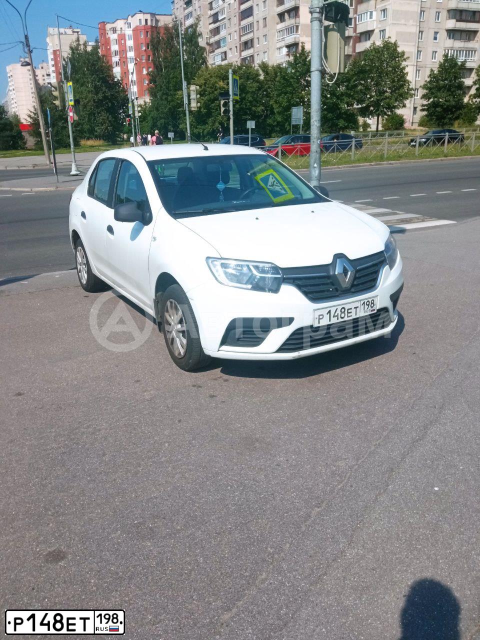 Фото автомобиля RENAULT LOGAN, 2018 — госномер Р148ЕТ198. Цвет: Белый