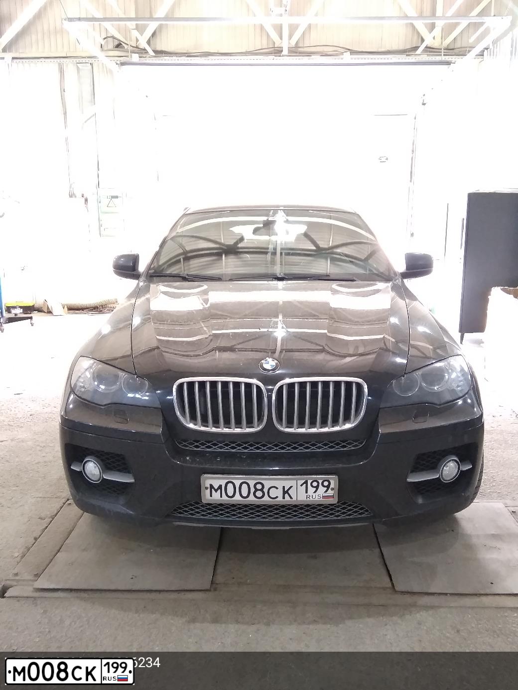 Фото автомобиля BMW X6, 2008 — госномер М008СК199. Цвет: ЧЕРНЫЙ
