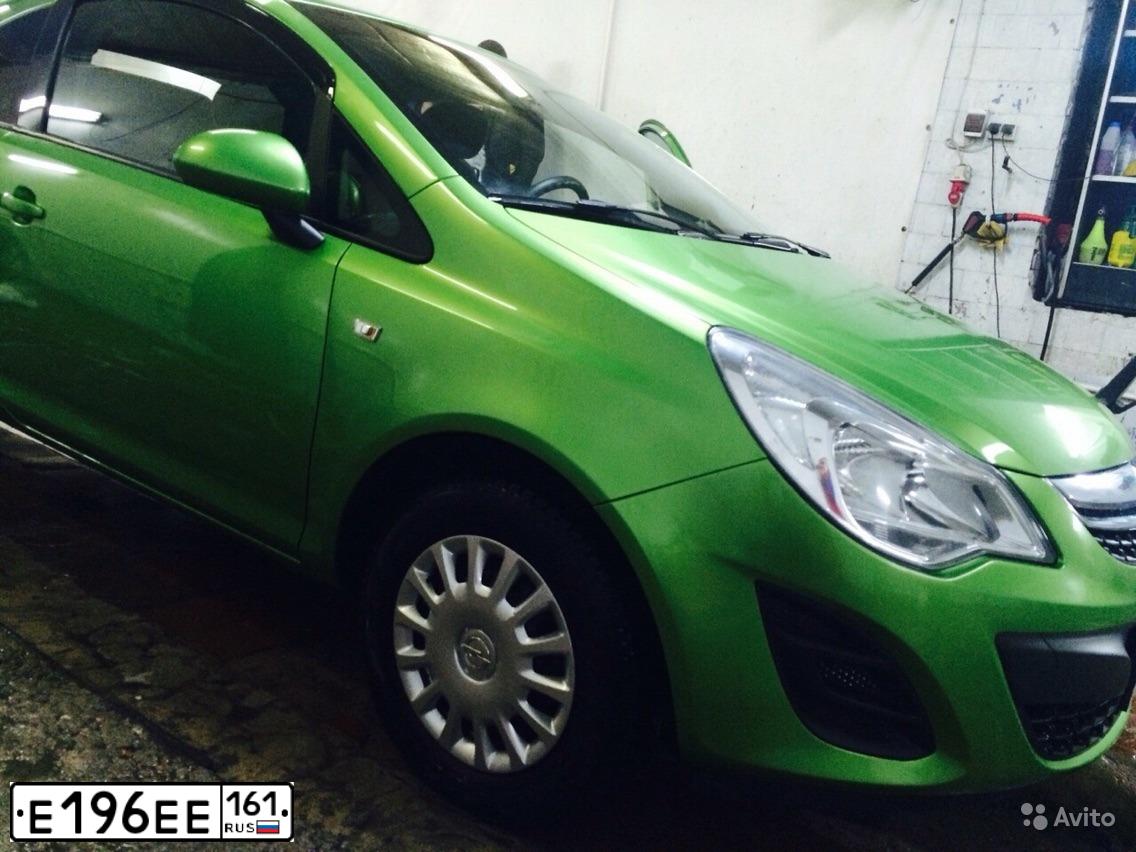 Фото автомобиля OPEL CORSA, 2011 — госномер Е196ЕЕ161. Цвет: ЗЕЛЕНЫЙ