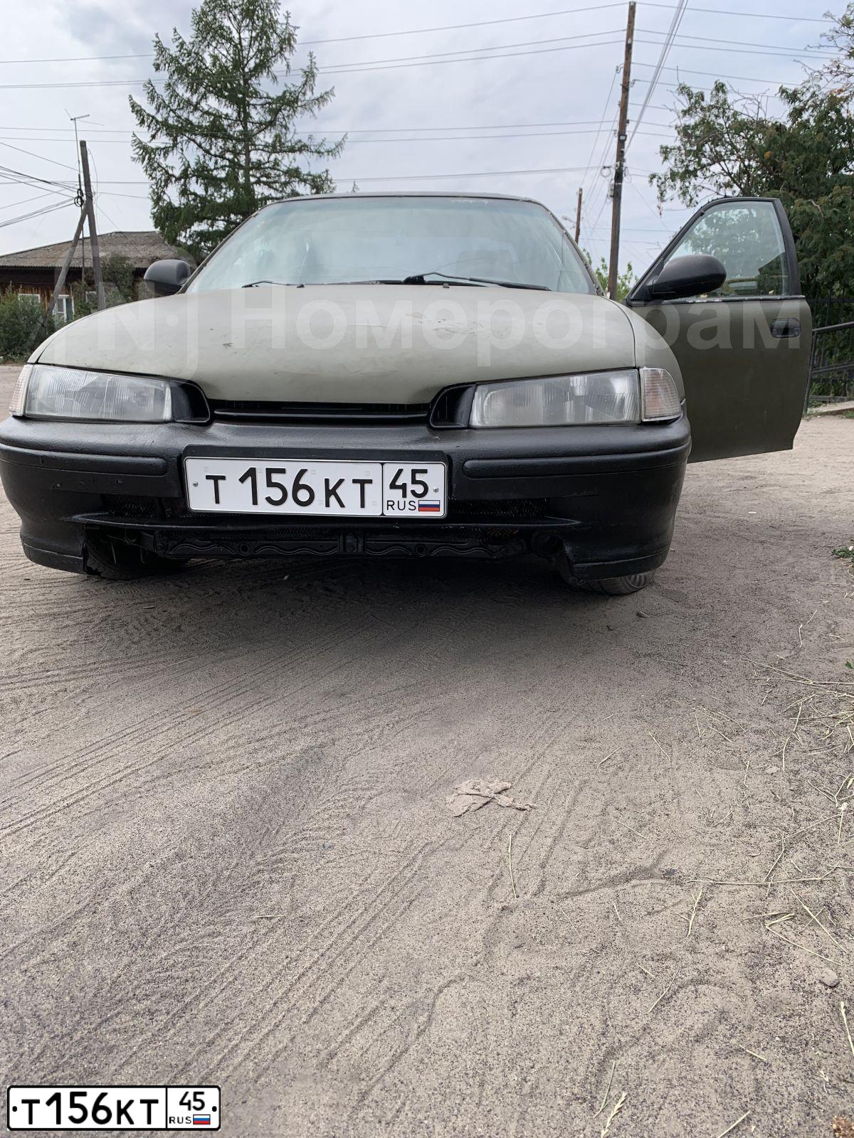 Фото автомобиля HONDA ACCORD, 1995 — госномер Т156КТ45. Цвет: ЗЕЛЕНЫЙ