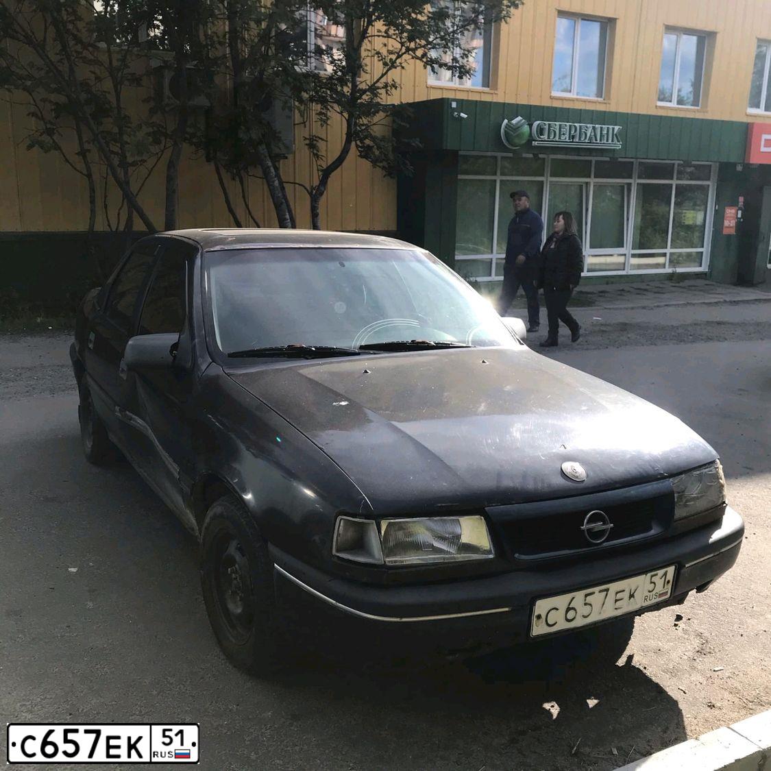 Фото автомобиля OPEL VECTRA, 1991 — госномер С657ЕК51. Цвет: ТЕМНО-СИНИЙ