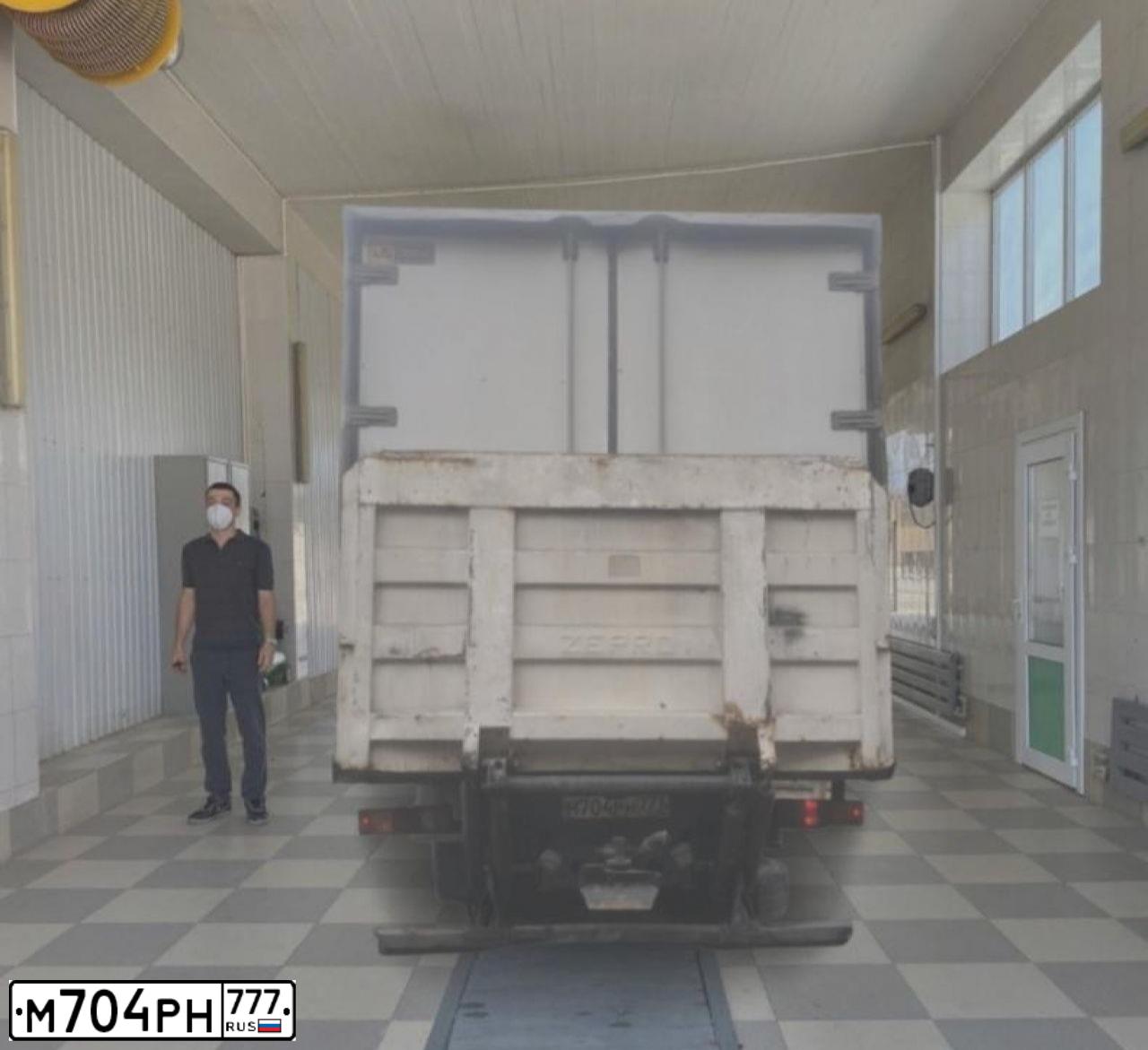 Фото автомобиля MERCEDES ACTROS, 2000 — госномер М704РН777. Цвет: ЗЕЛЕНЫЙ