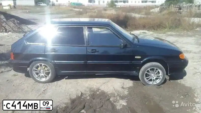 Фото автомобиля LADA 2114 SAMARA, 2003 — госномер В957РЕ09. Цвет: ГРАФИТОВЫЙ МЕТАЛЛИК