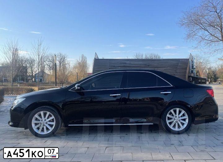 Фото автомобиля TOYOTA CAMRY, 2012 — госномер Х919ЕС05. Цвет: ЧЕРНЫЙ МЕТАЛЛИК