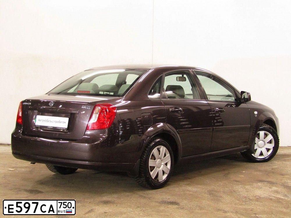 Фото автомобиля DAEWOO GENTRA, 2018 — госномер С394УН196. Цвет: Коричневый
