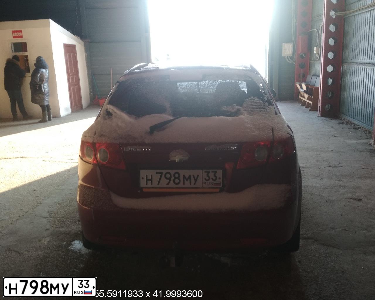 Фото автомобиля CHEVROLET LACETTI, 2007 — госномер Е603КТ150. Цвет: ТЕМНО-КРАСНЫЙ