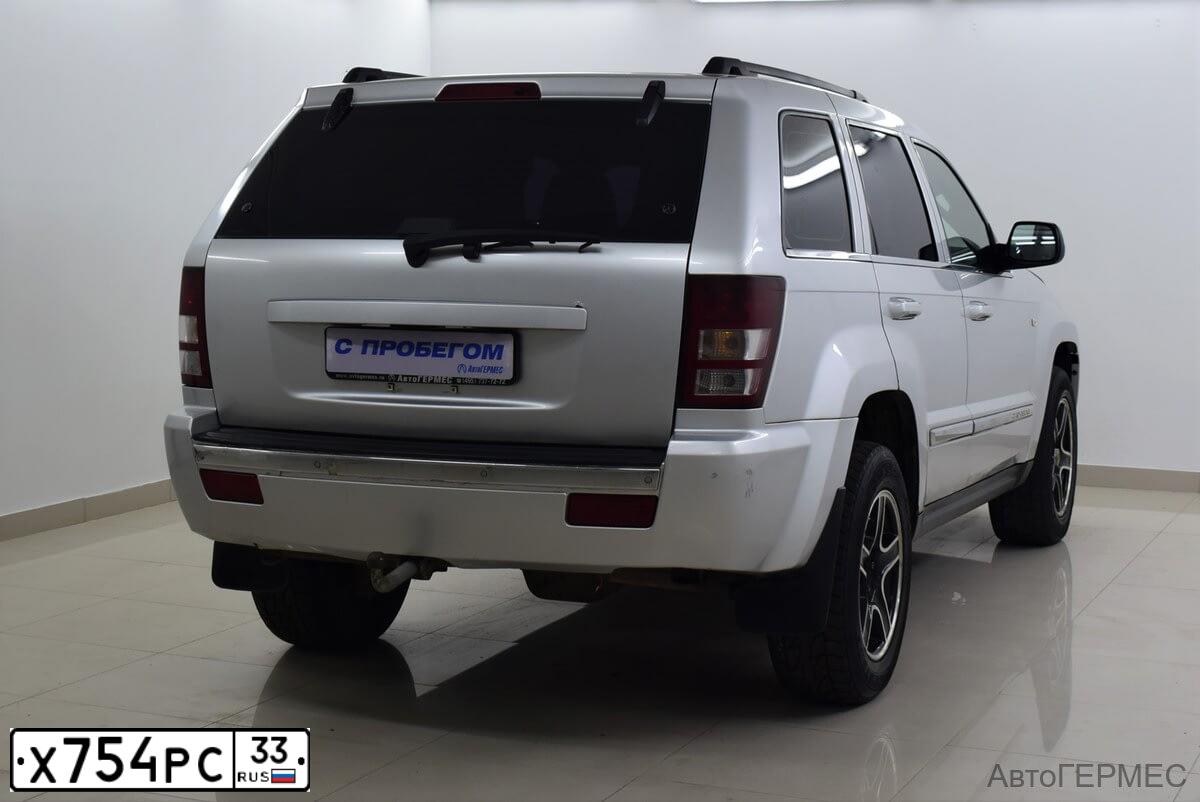 Фото автомобиля JEEP GRAND CHEROKEE, 2005 — госномер С334АА799. Цвет: СВЕТЛО-СЕРЫЙ