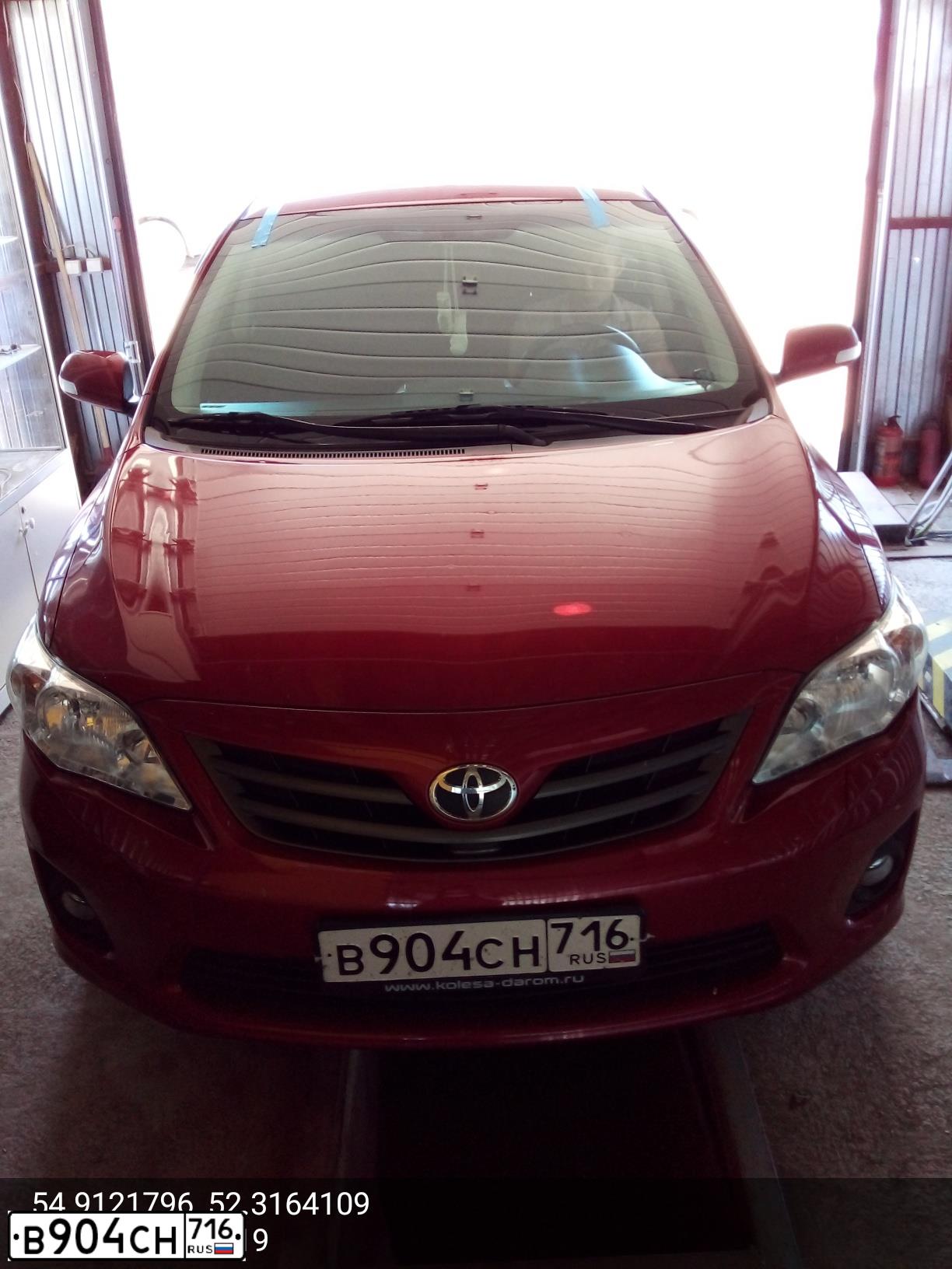 Фото автомобиля TOYOTA COROLLA, 2010 — госномер В904СН716. Цвет: Красный