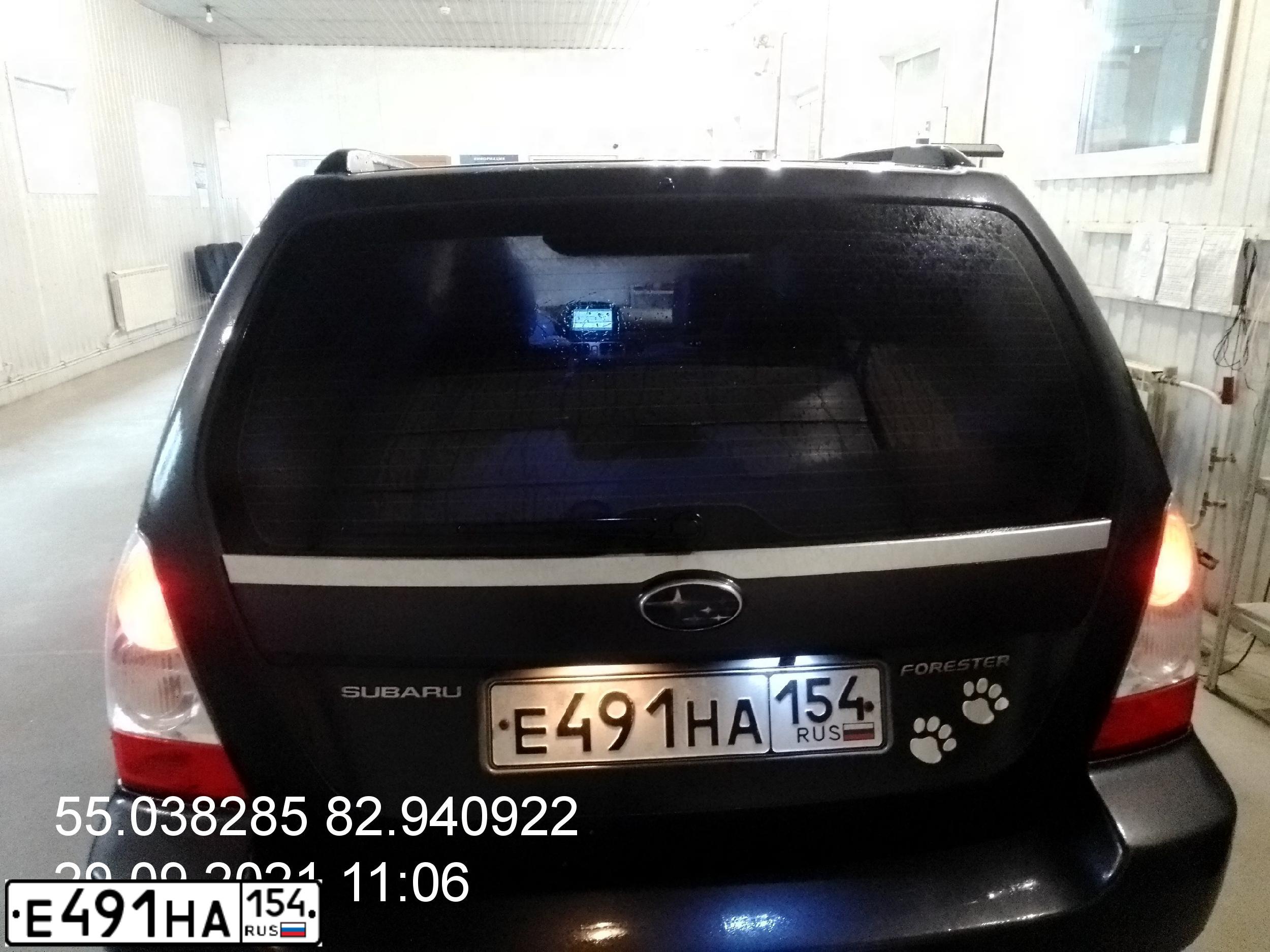 Фото автомобиля SUBARU FORESTER, 2007 — госномер Е491НА154. Цвет: СЕРЫЙ