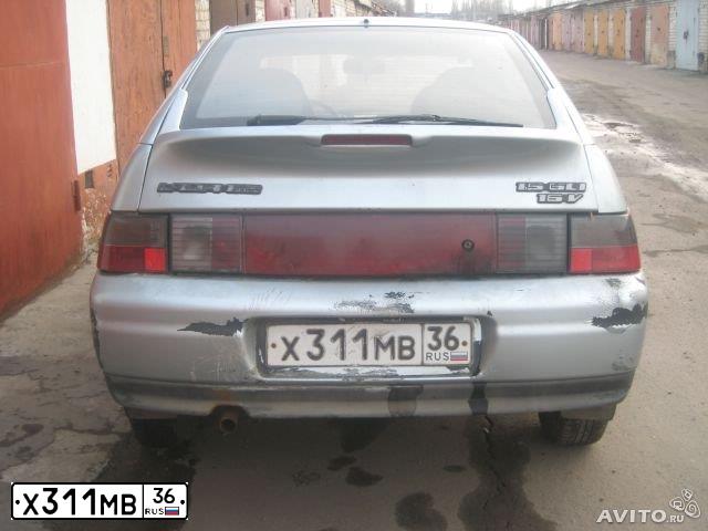 Фото автомобиля LADA 2112, 2001 — госномер Х311МВ36. Цвет: СЕРЕБР.ГОЛУБОЙ