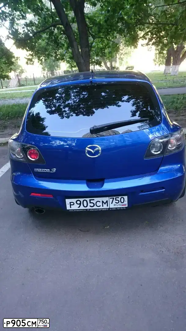 Фото автомобиля MAZDA A 3, 2007 — госномер В525КМ190. Цвет: СИНИЙ