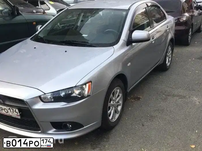 Фото автомобиля MITSUBISHI LANCER, 2012 — госномер Н626СТ178. Цвет: СИНИЙ