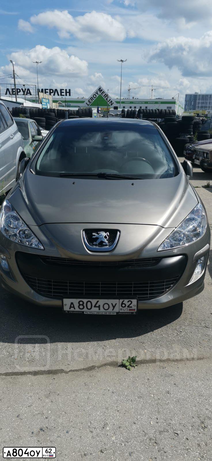 Фото автомобиля PEUGEOT 308, 2011 — госномер У186ОМ62. Цвет: СЕРО-БЕЖЕВЫЙ