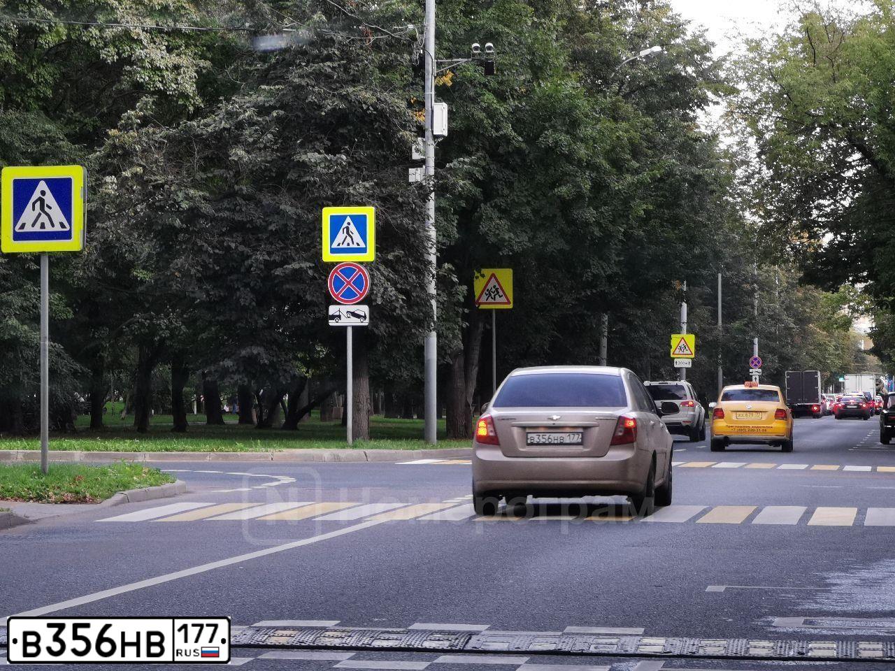 Фото автомобиля CHEVROLET LACETTI, 2006 — госномер Х648НТ138. Цвет: БЕЖЕВЫЙ