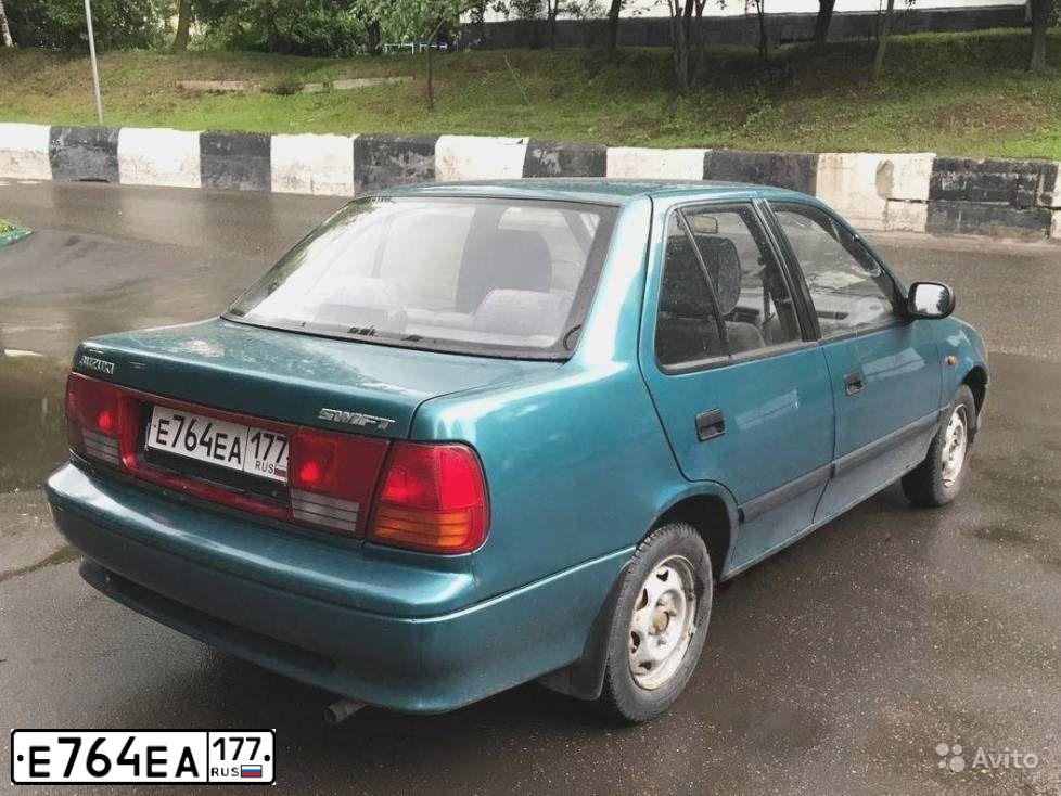 Фото автомобиля SUZUKI SWIFT, 2003 — госномер К170НТ799. Цвет: ЗЕЛЕНЫЙ
