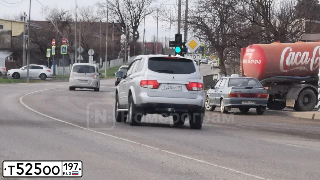 Фото автомобиля AUDI A7, 2011 — госномер М004КА77. Цвет: ЧЕРНЫЙ