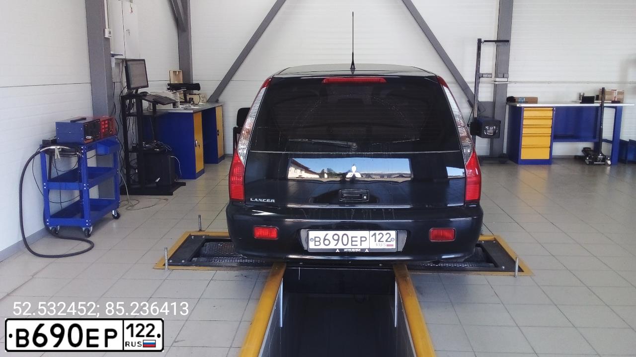 Фото автомобиля MITSUBISHI LANCER, 2007 — госномер К563РС64. Цвет: ЧЕРНЫЙ