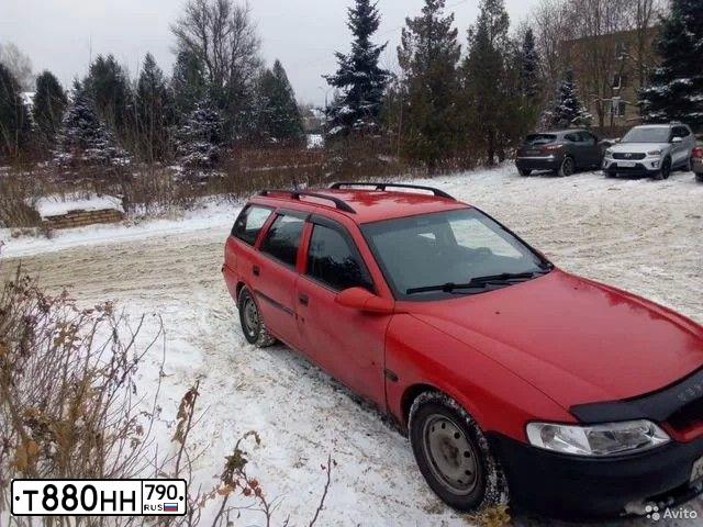 Фото автомобиля OPEL VECTRA, 1997 — госномер Т880НН790. Цвет: Красный