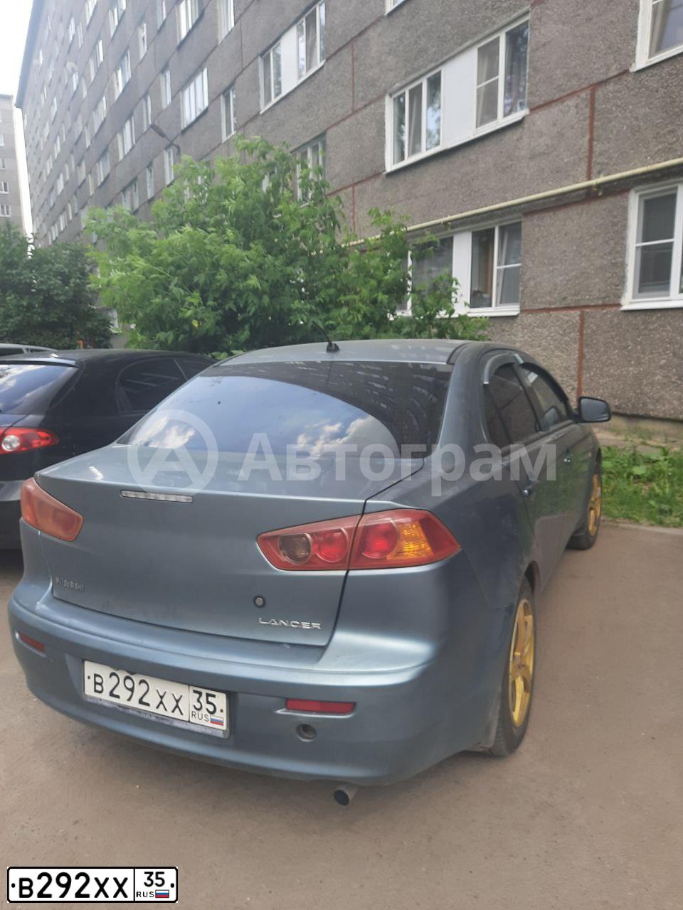 Фото автомобиля MITSUBISHI LANCER, 2007 — госномер В292ХХ35. Цвет: СВЕТЛО-СЕРО-ЗЕЛЕНЫЙ