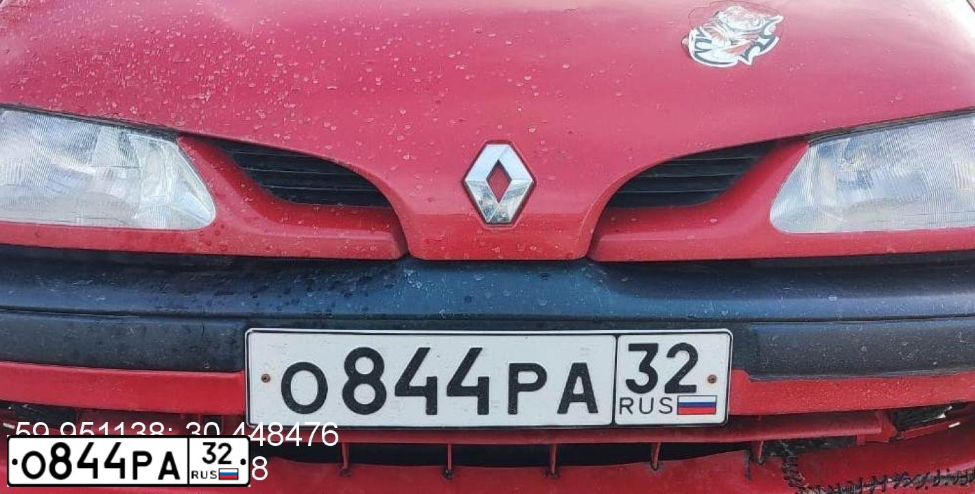 Фото автомобиля RENAULT MEGANE /GRAND/ SCENIC, 1999 — госномер В229ЕТ67. Цвет: Красный