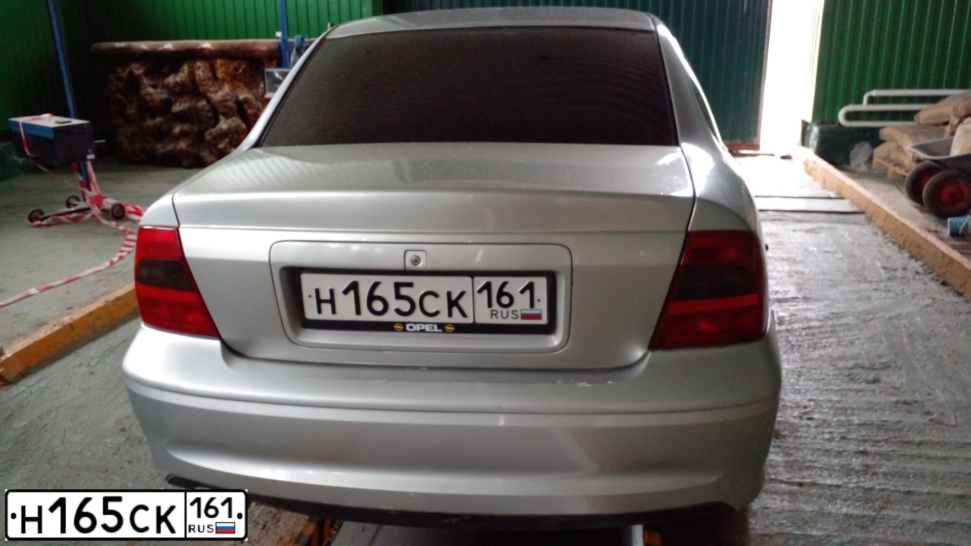 Фото автомобиля CHEVROLET AVEO, 2013 — госномер О047ТО161. Цвет: ЧЕРНЫЙ