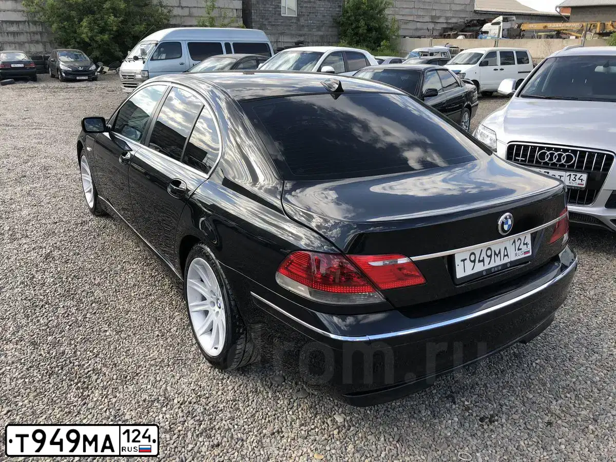 Фото автомобиля BMW SERIE 7, 2005 — госномер Т949МА124. Цвет: ЧЕРНЫЙ