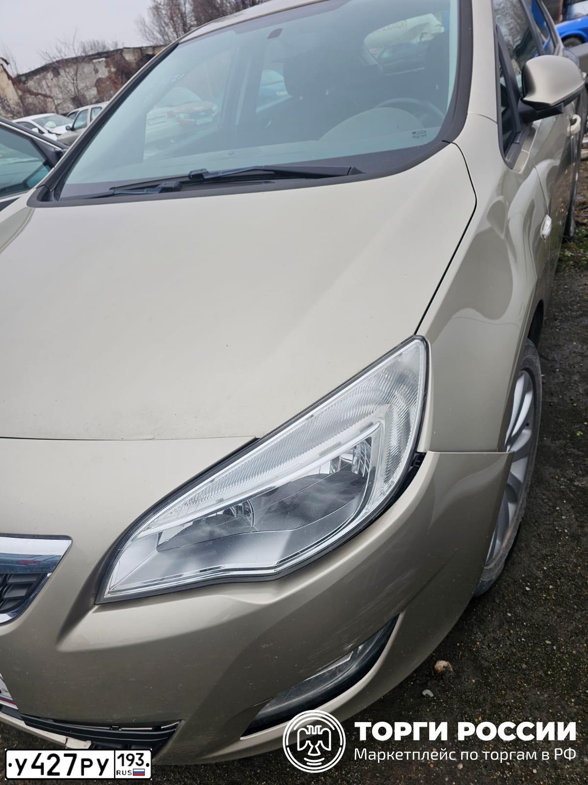 Фото автомобиля OPEL ASTRA, 2011 — госномер У427РУ193. Цвет: БЕЖЕВЫЙ МЕТАЛЛИК