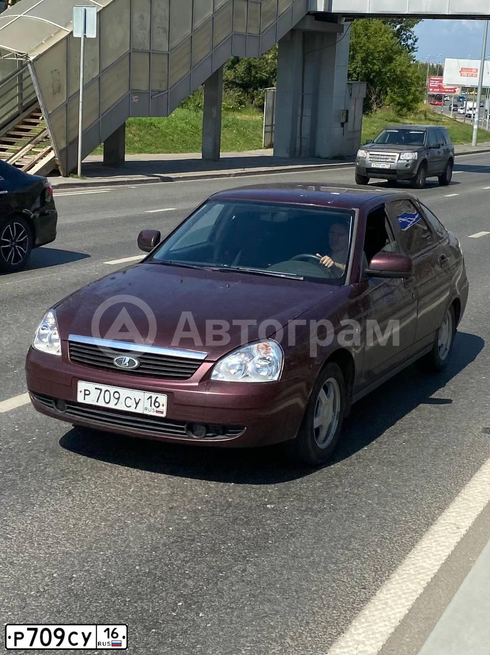 Фото автомобиля LADA 2172 PRIORA, 2009 — госномер Р709СУ16. Цвет: ТЕМНО-ВИШНЕВЫЙ