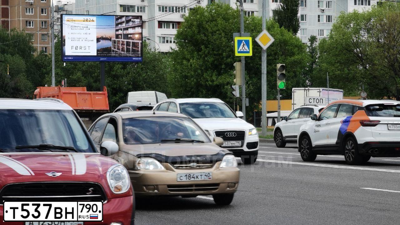 Фото автомобиля KIA SPECTRA, 2008 — госномер Р214РТ190. Цвет: Золотисто-бежевый