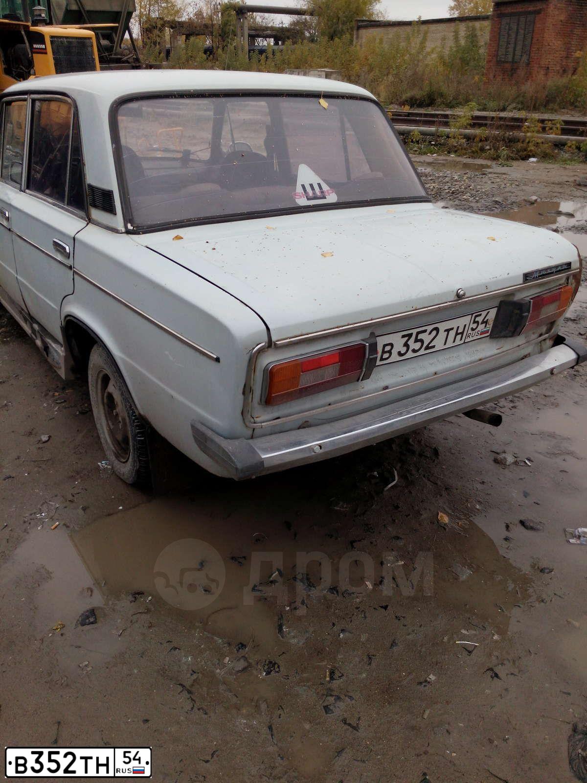 Фото автомобиля LADA 2106, 1979 — госномер В352МН54. Цвет: СВ СЕРЫЙ