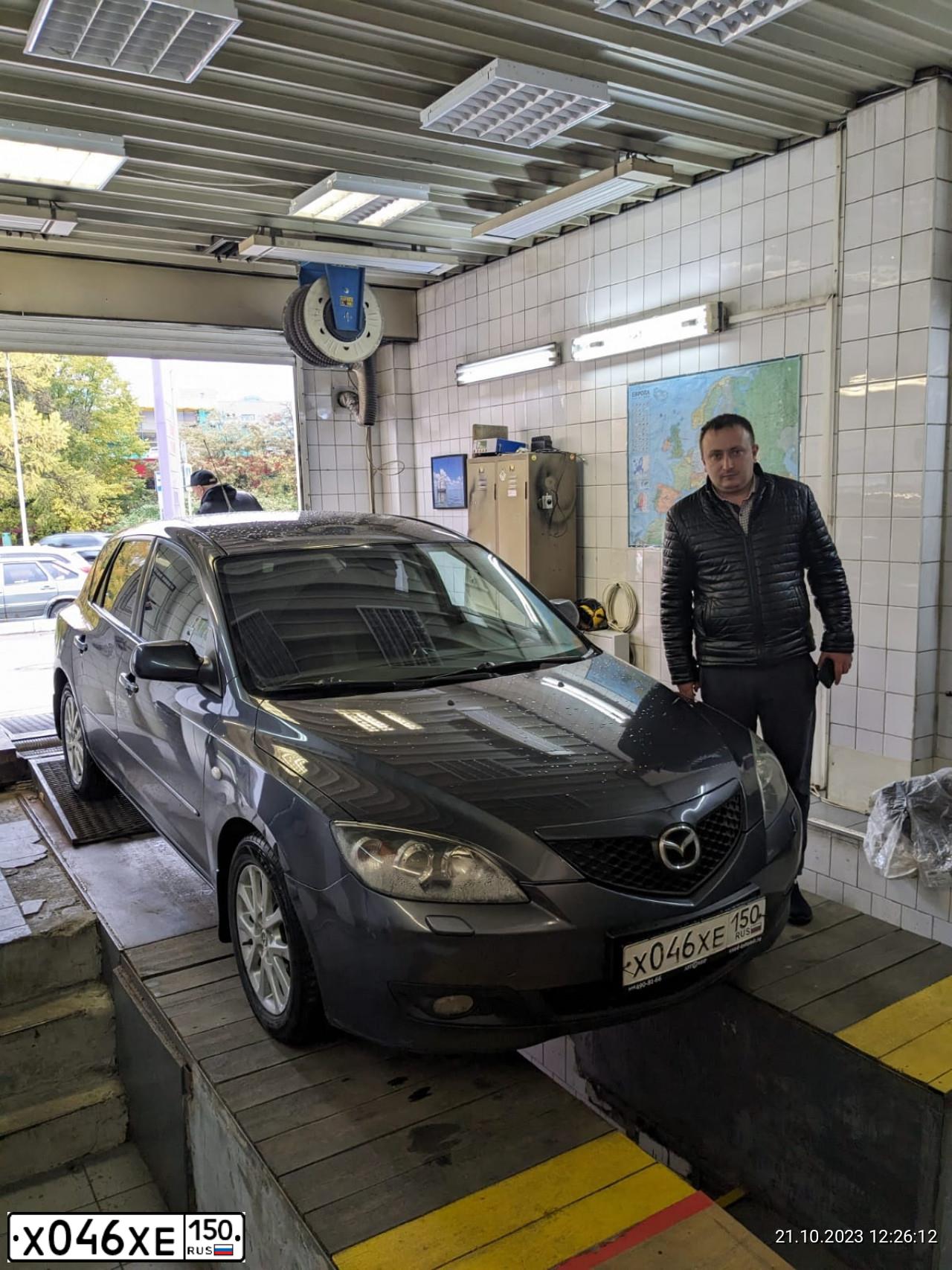 Фото автомобиля MAZDA 3, 2008 — госномер М365РВ13. Цвет: СЕРЫЙ