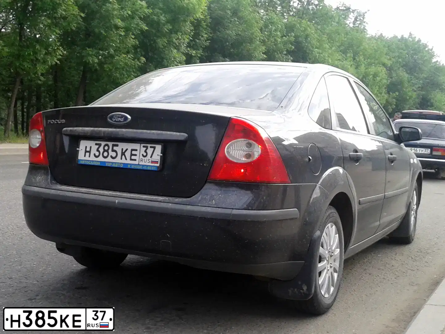 Фото автомобиля FORD ФОРД ФОКУС, 2006 — госномер Н385КЕ37. Цвет: ЧЕРНЫЙ