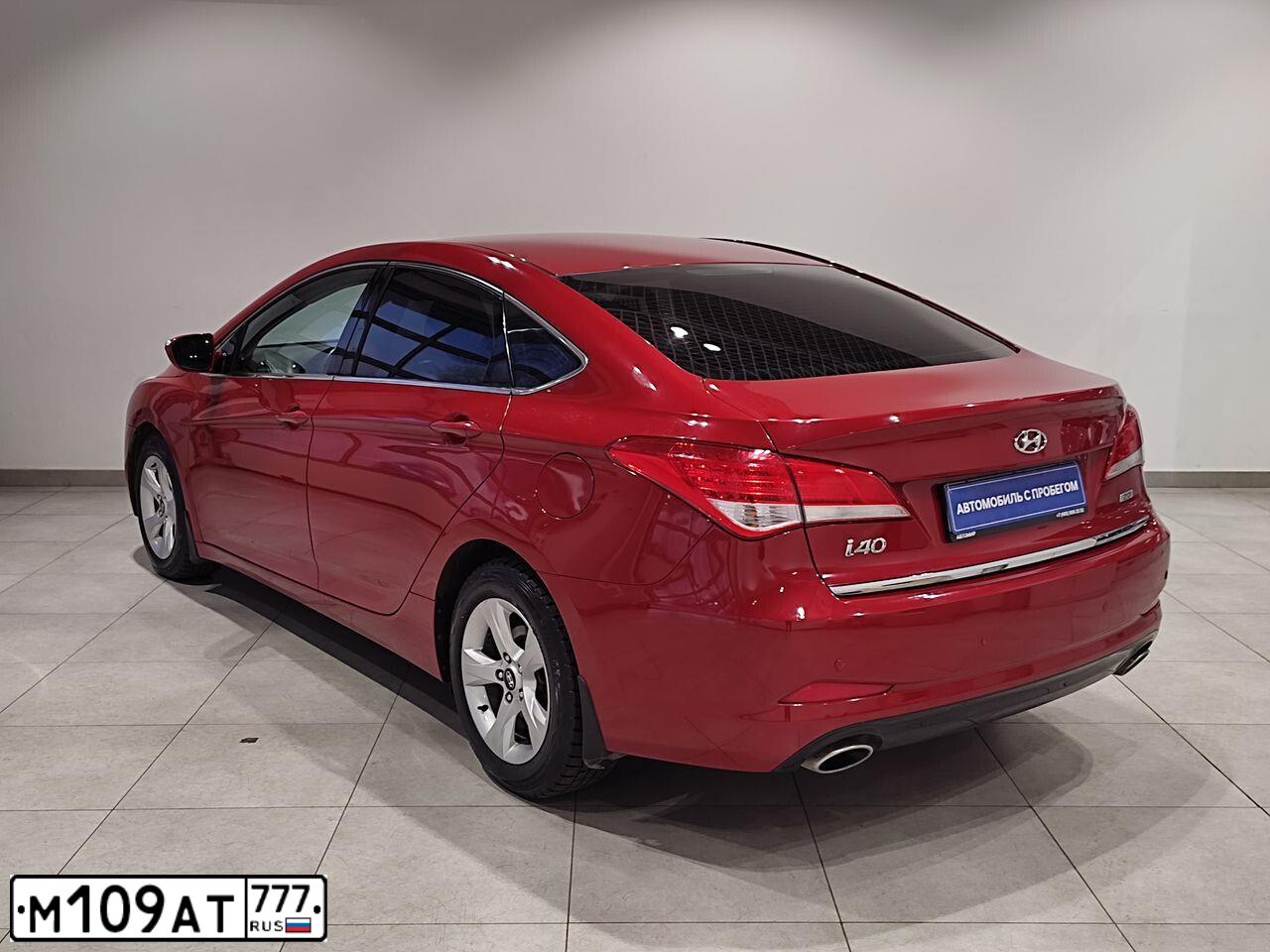 Фото автомобиля HYUNDAI I40, 2013 — госномер Т824АР977. Цвет: КРАСНЫЙ
