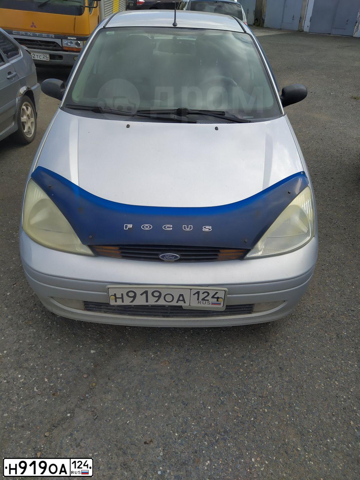 Фото автомобиля FORD FOCUS, 2002 — госномер Н919ОА124. Цвет: СЕРЕБРИСТЫЙ