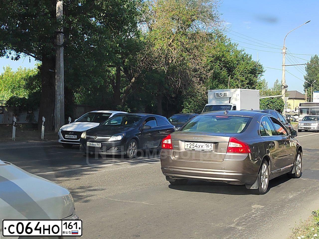Фото автомобиля OPEL ASTRA, 2007 — госномер С064НО161. Цвет: ЧЕРНЫЙ