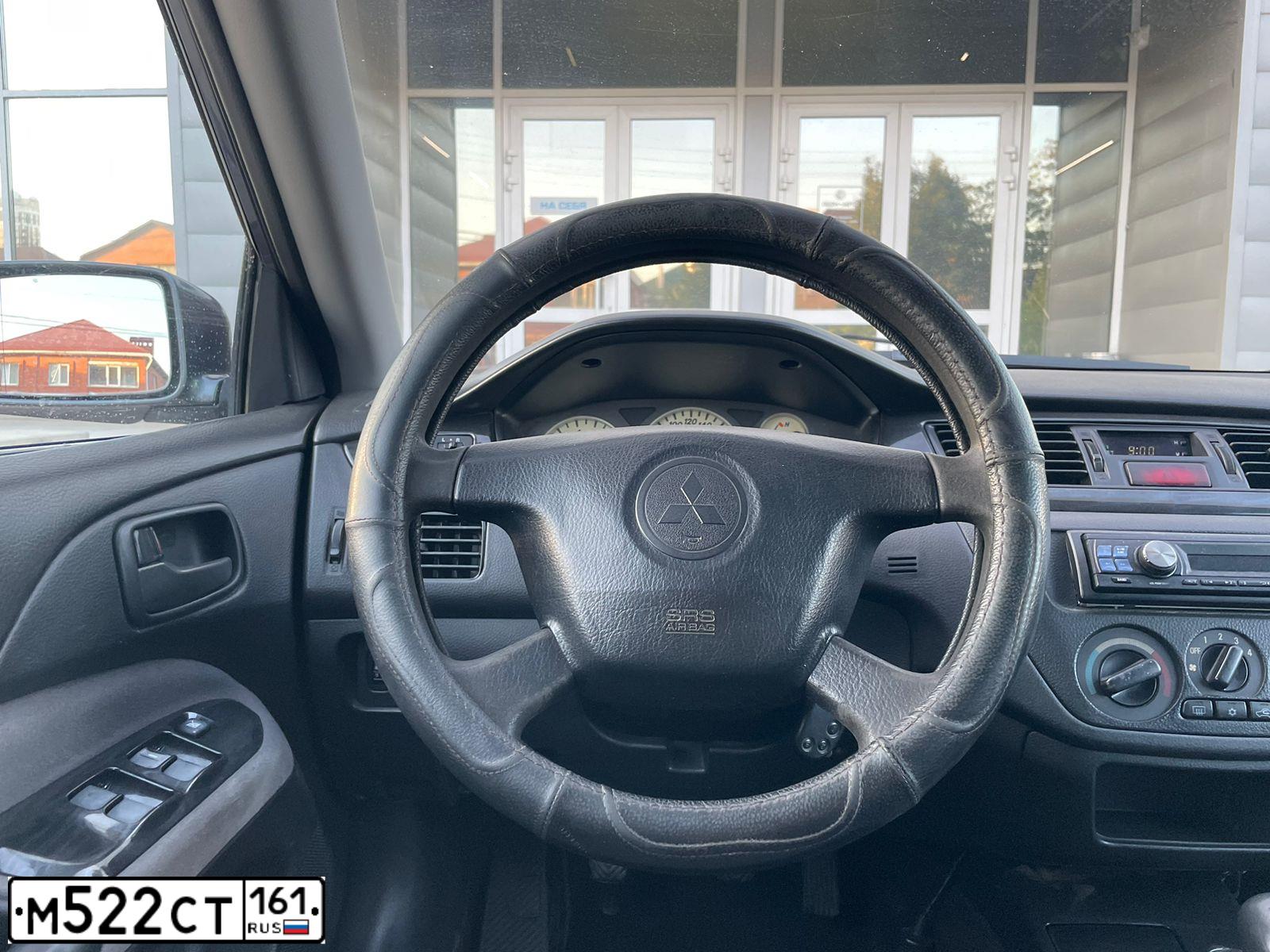 Фото автомобиля MITSUBISHI LANCER, 2005 — госномер Н430СС193. Цвет: СЕРЫЙ