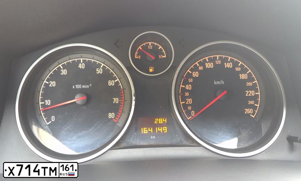 Фото автомобиля OPEL ASTRA, 2010 — госномер Х714ТМ161. Цвет: ЧЕРНЫЙ