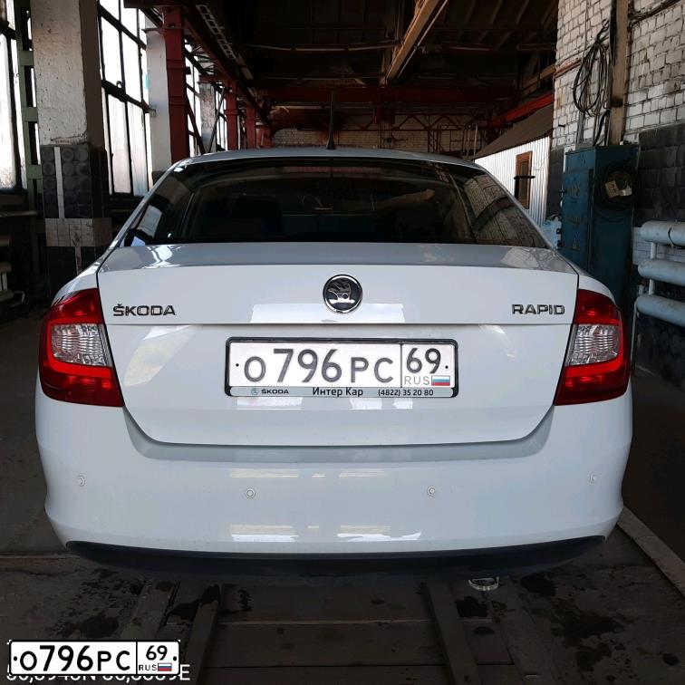 Фото автомобиля SKODA RAPID, 2014 — госномер О796РС69. Цвет: БЕЛЫЙ